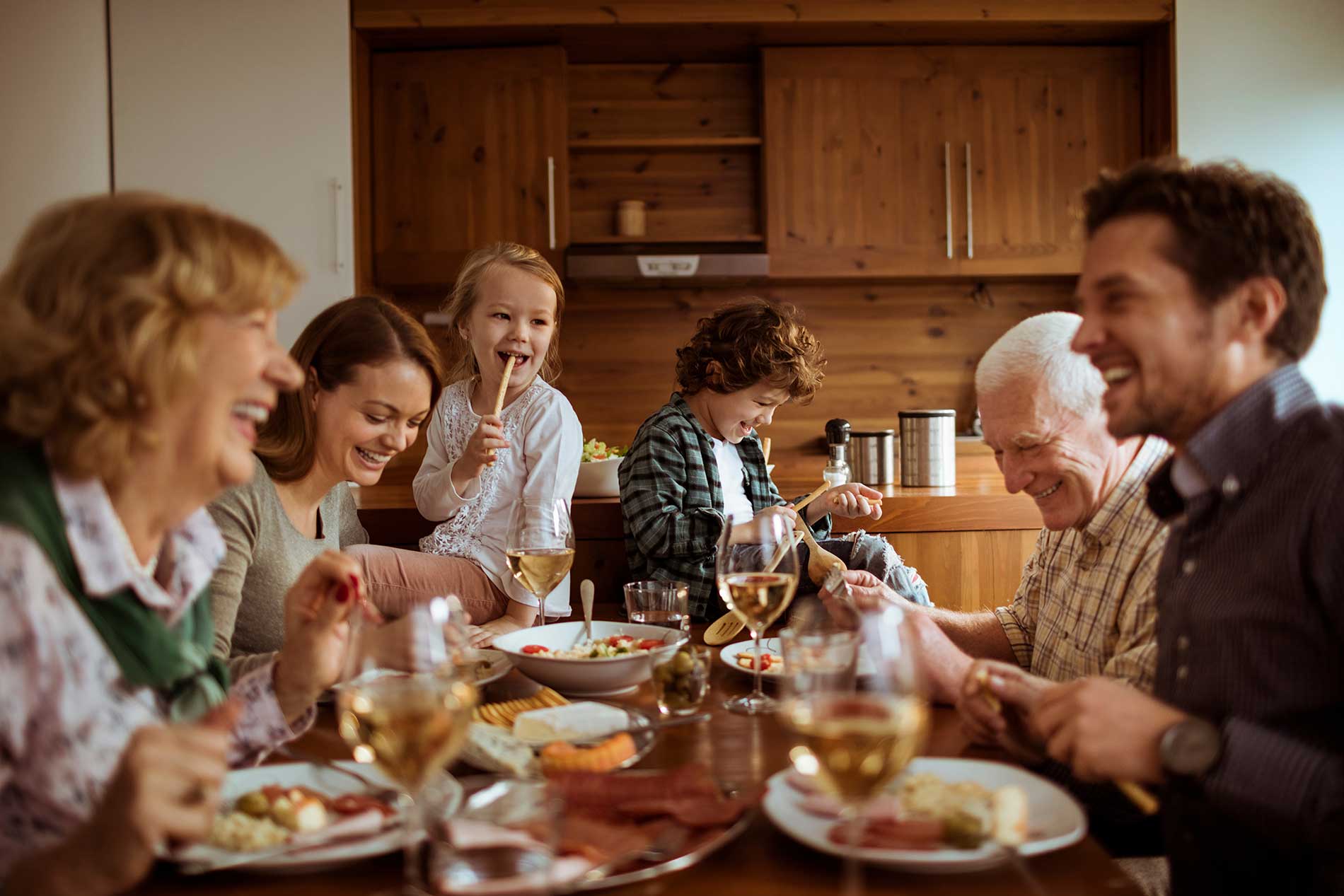 family having dinner together family having dinner together